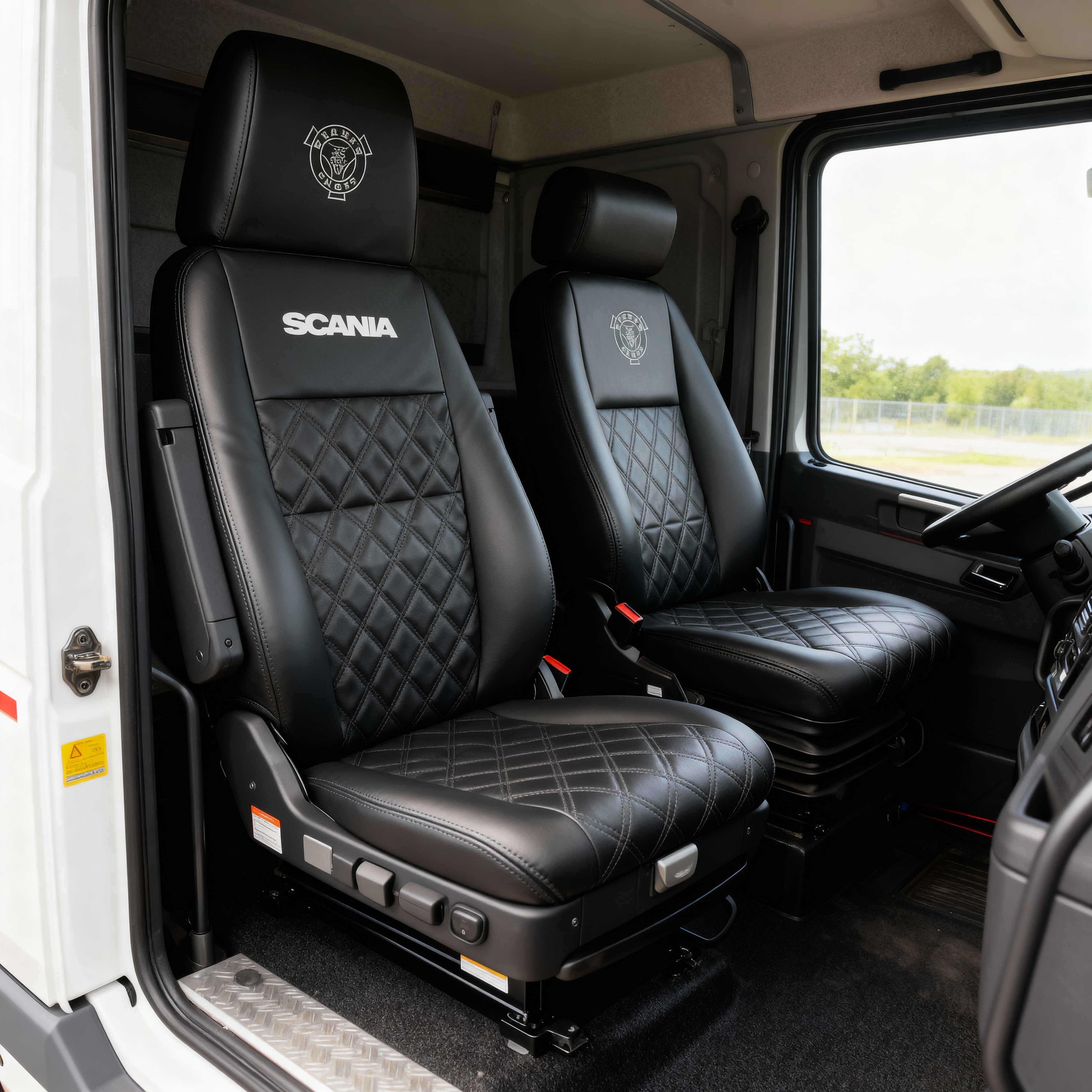 Scania black vinyl seats with logos and Bentley stitching upholstery Stockton on Tees